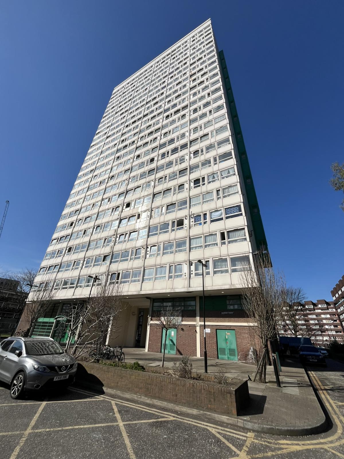 White tower block, taken from the bottom looking up