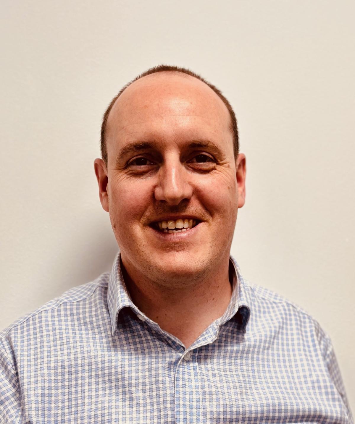 Headshot of Andrew Wholley